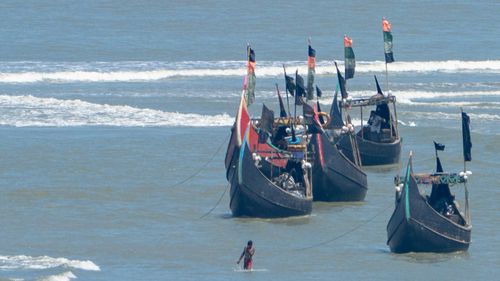 Free Fishing boats anchored near Inani Beach, a scenic spot in Cox's Bazar, Bangladesh. Stock Photo