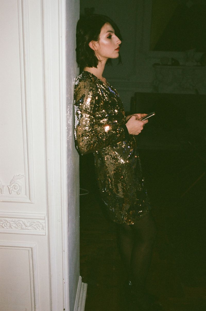 Woman in a sparkling sequin evening dress