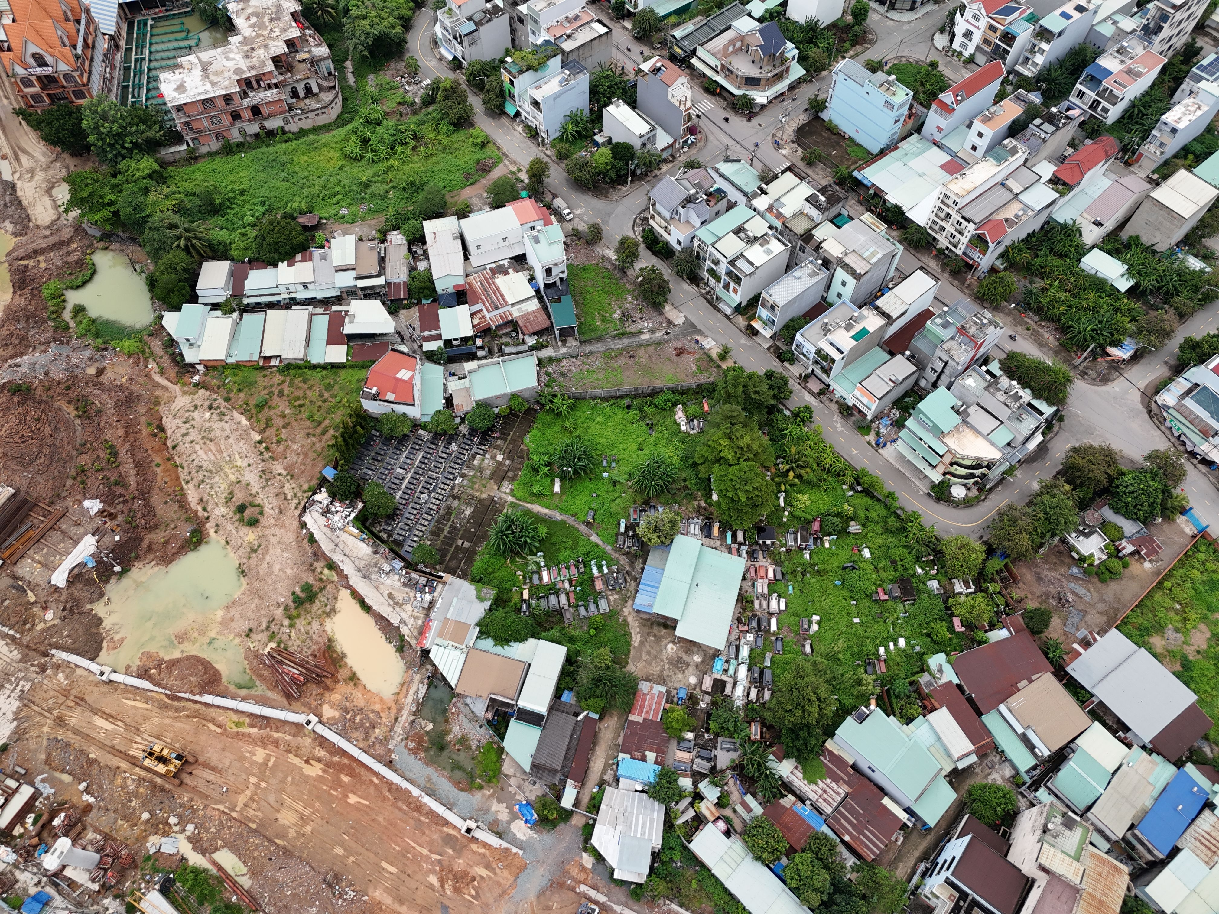 Aerial view of Ho Municipality showing a mix of residential areas and a modern church building complex