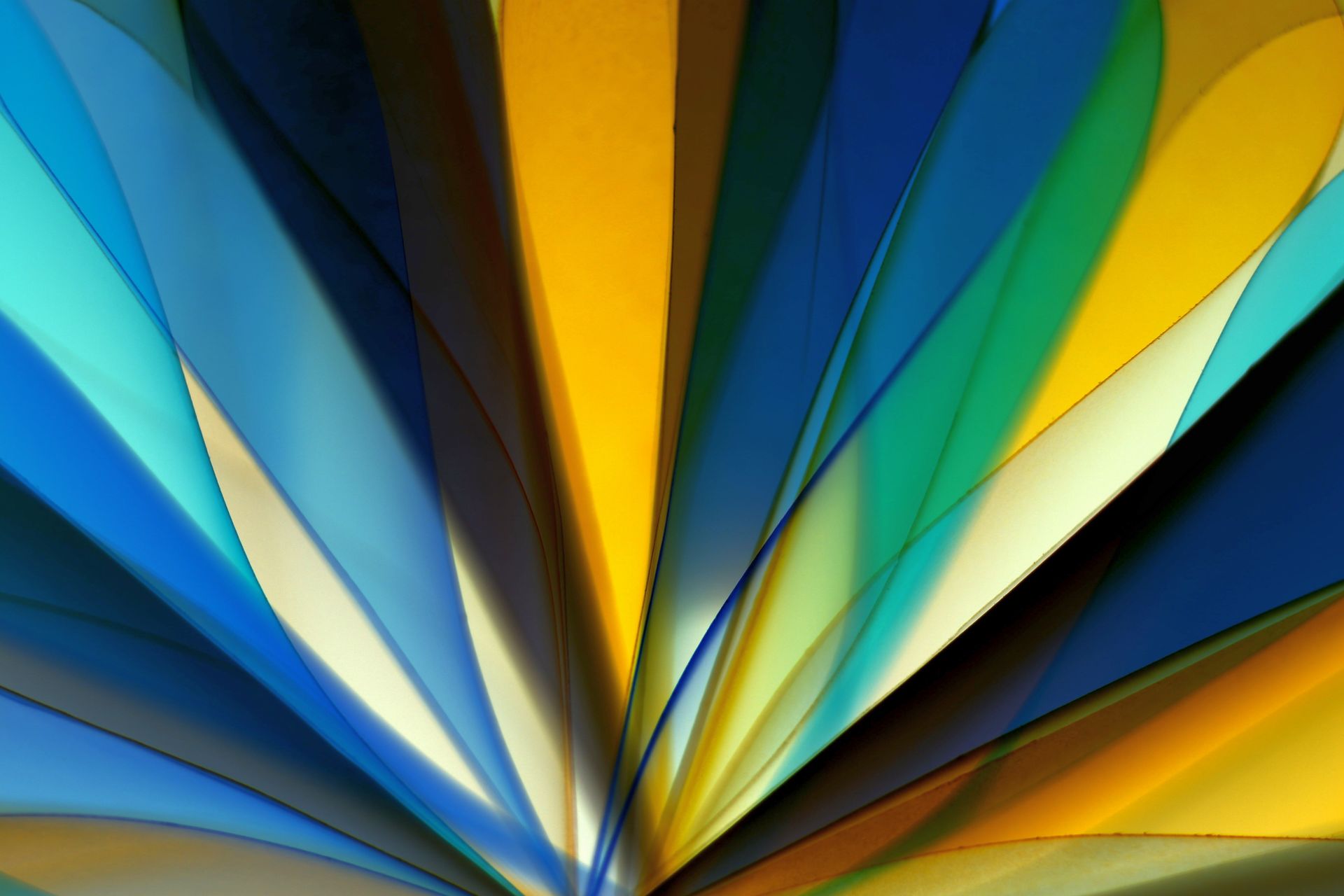 Dynamic abstract design with vibrant blues and yellows, creating a visually striking composition.