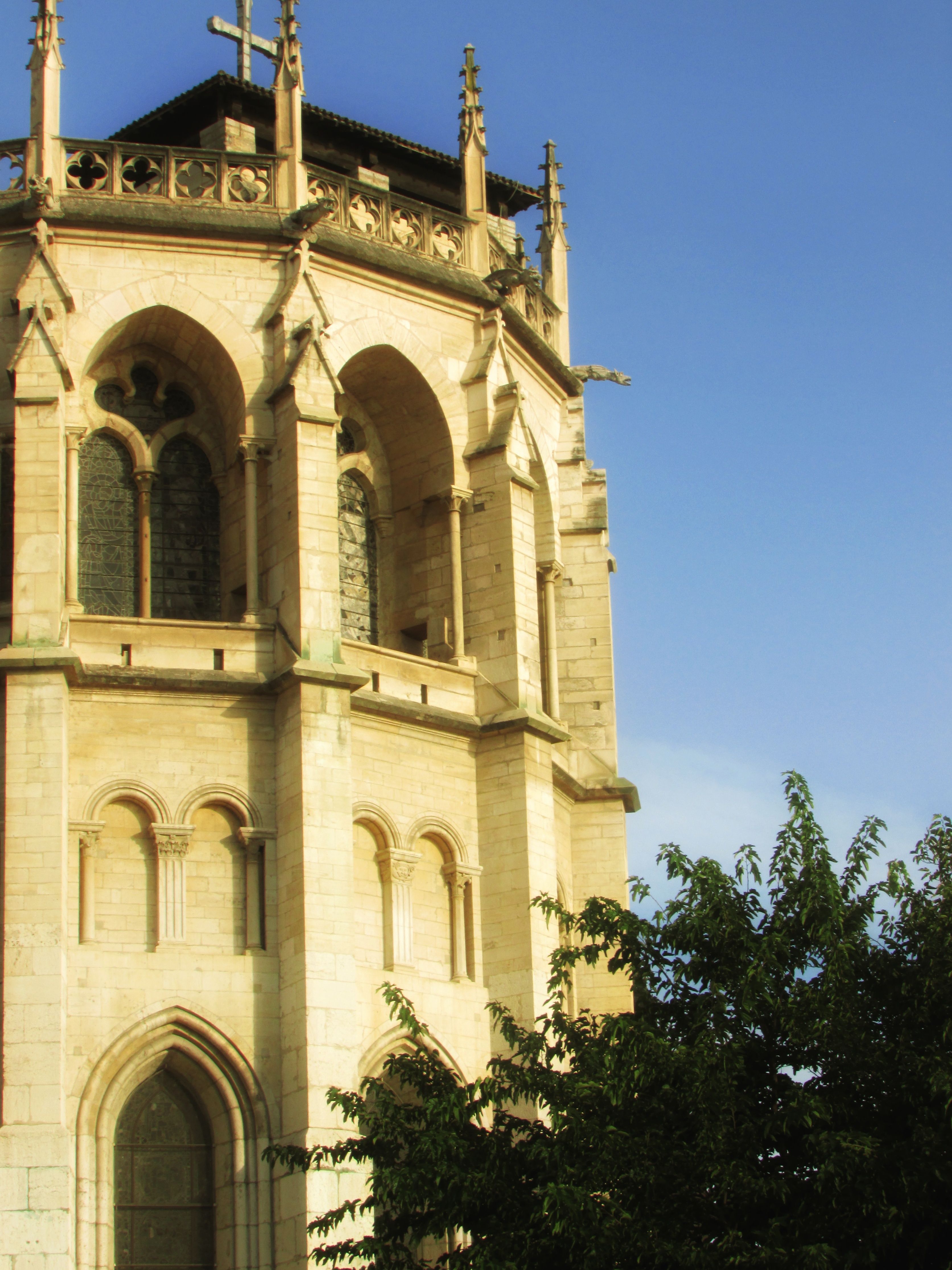Historic Gothic Church Tower Against Blue Sky · Free Stock Photo