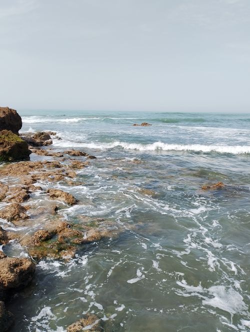 Free Scenic view of rocky shoreline and waves in Casablanca, Morocco on a clear day. Stock Photo