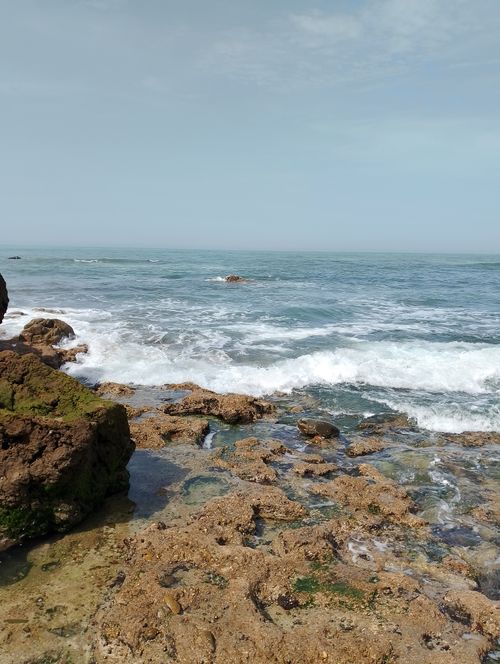 Free Explore the rugged coastline of Casablanca, Morocco, showcasing striking rocks and waves crashing. Stock Photo