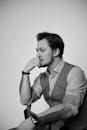Pensive Black and White Portrait of a Young Man