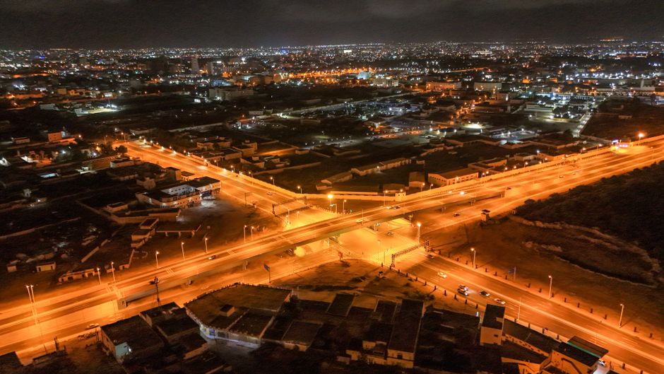 Stunning aerial view of illuminated streets in Nouakchott, Mauritania during nighttime.