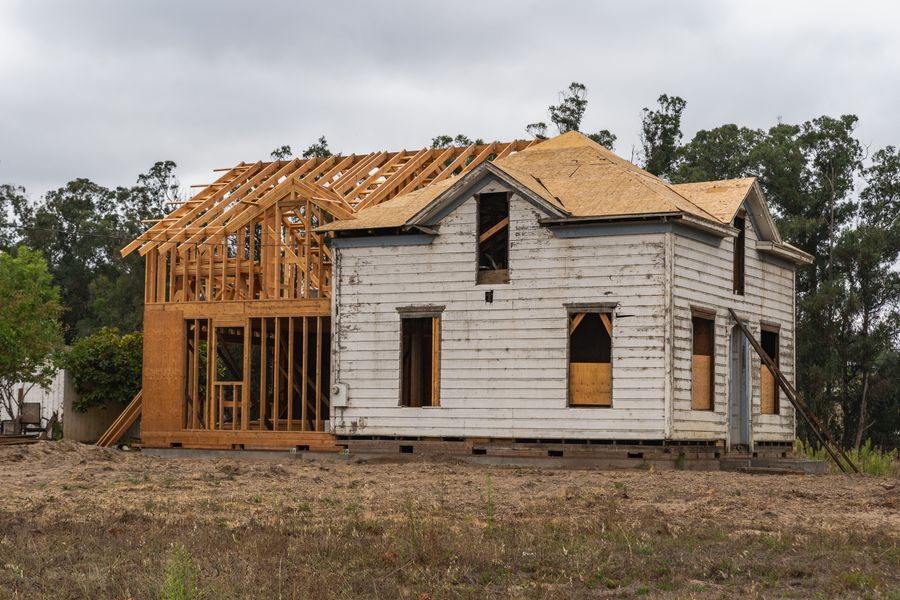 Timber-framed dwelling part-way through construction — photo by Robert So on Pexels
