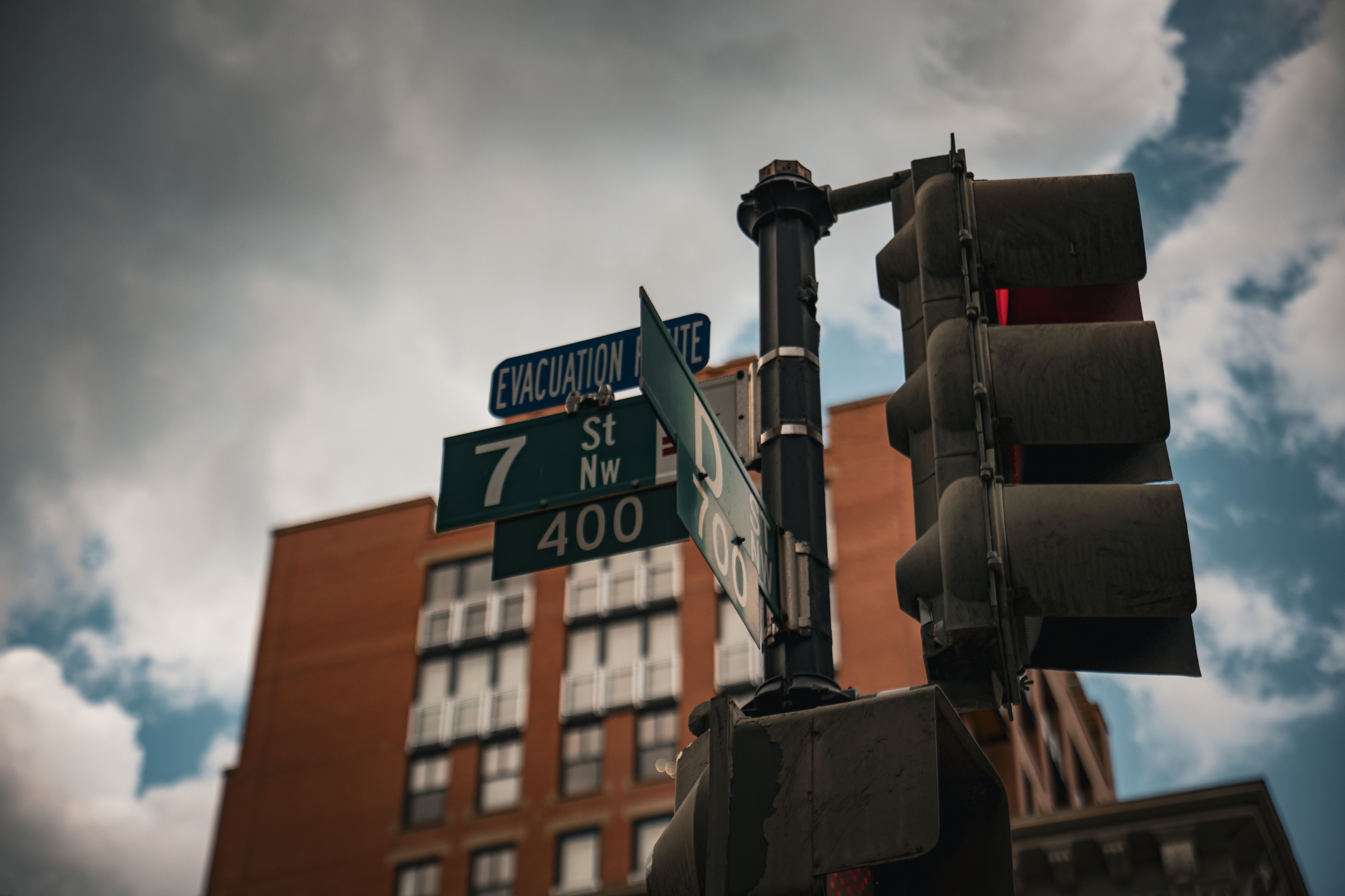 Urban Intersection with Traffic Lights and Street Signs · Free Stock Photo