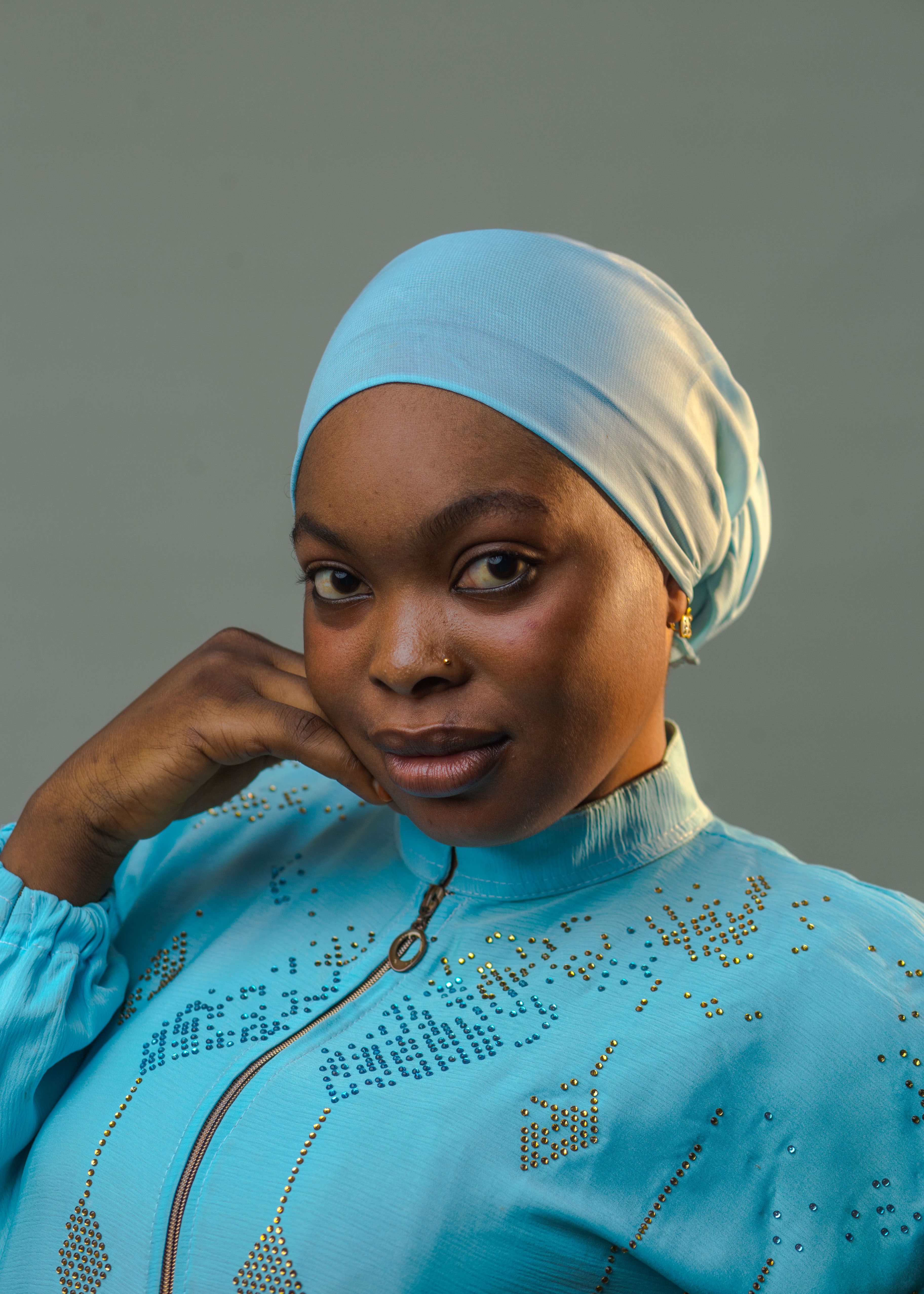 Portrait of a Stylish Woman in Blue Hijab · Free Stock Photo