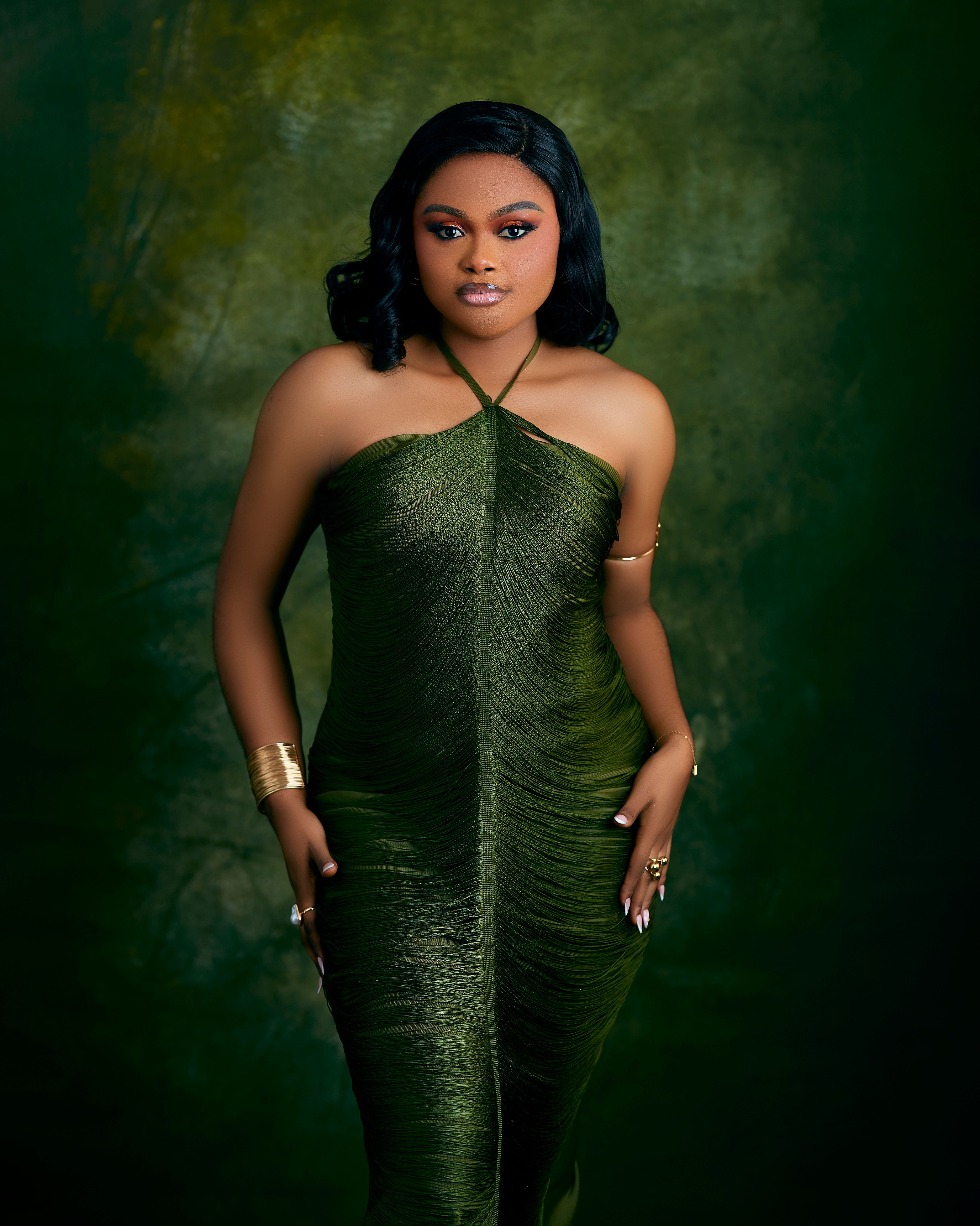 Elegant Woman in Green Halter Dress Portrait  Free Stock Photo