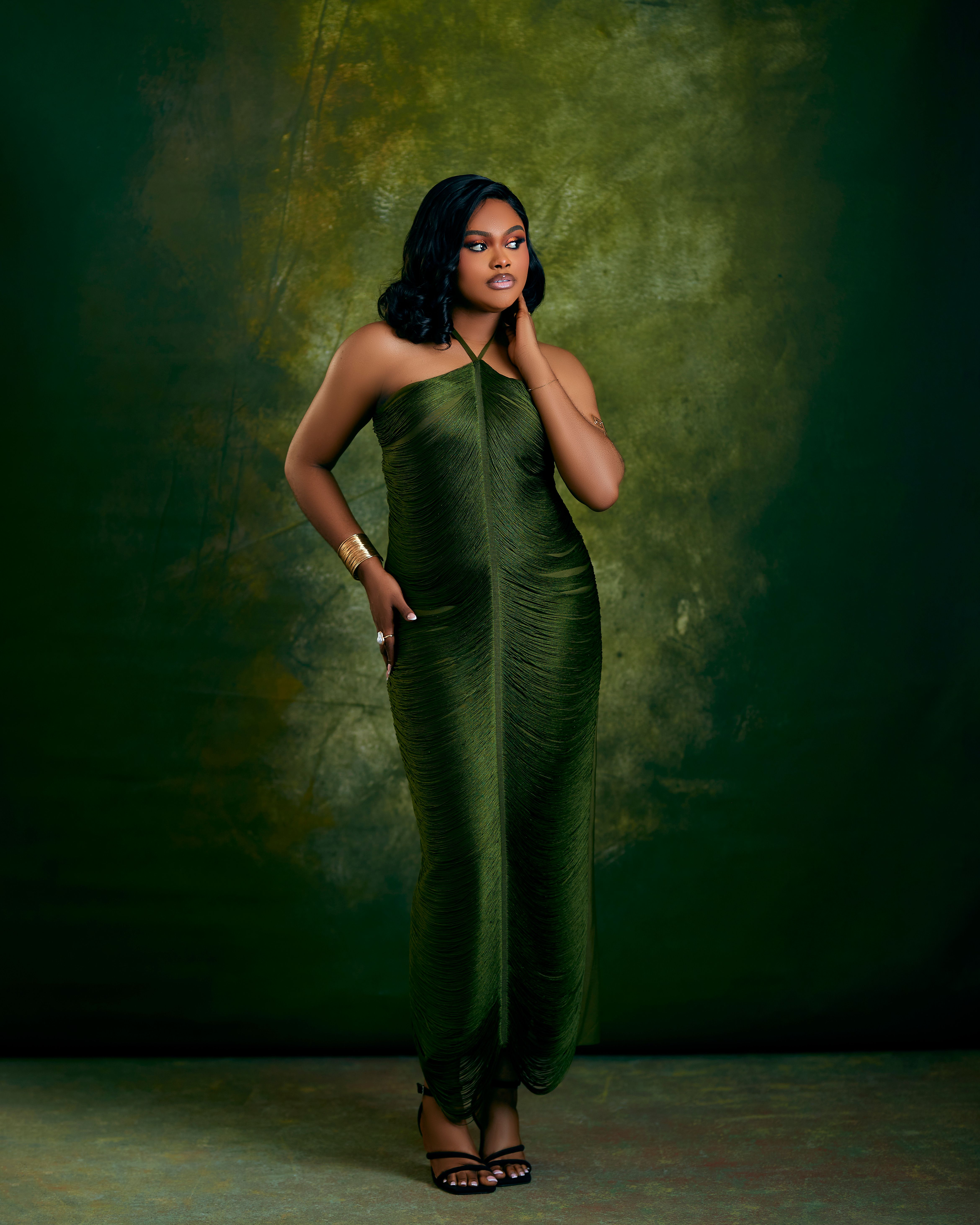 Elegant Woman in Stylish Green Dress Portrait · Free Stock Photo