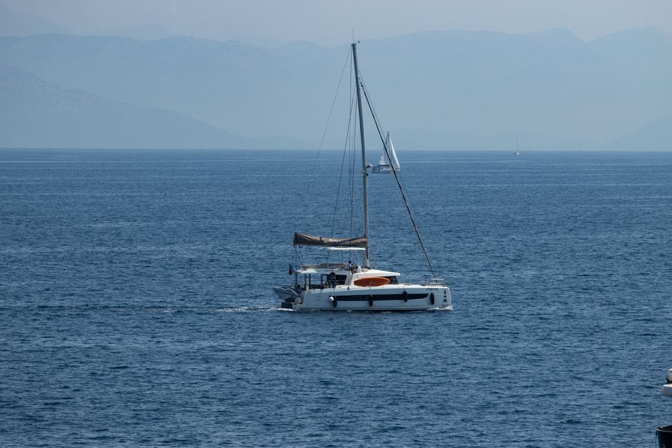 Stunning Private Daysail - Road Town to Norman Island Review: The Ultimate British Virgin Islands Yacht Charter Experience Review 2026 - A serene sailing yacht on the calm blue waters of the Ionian Sea, Corfu, Greece.