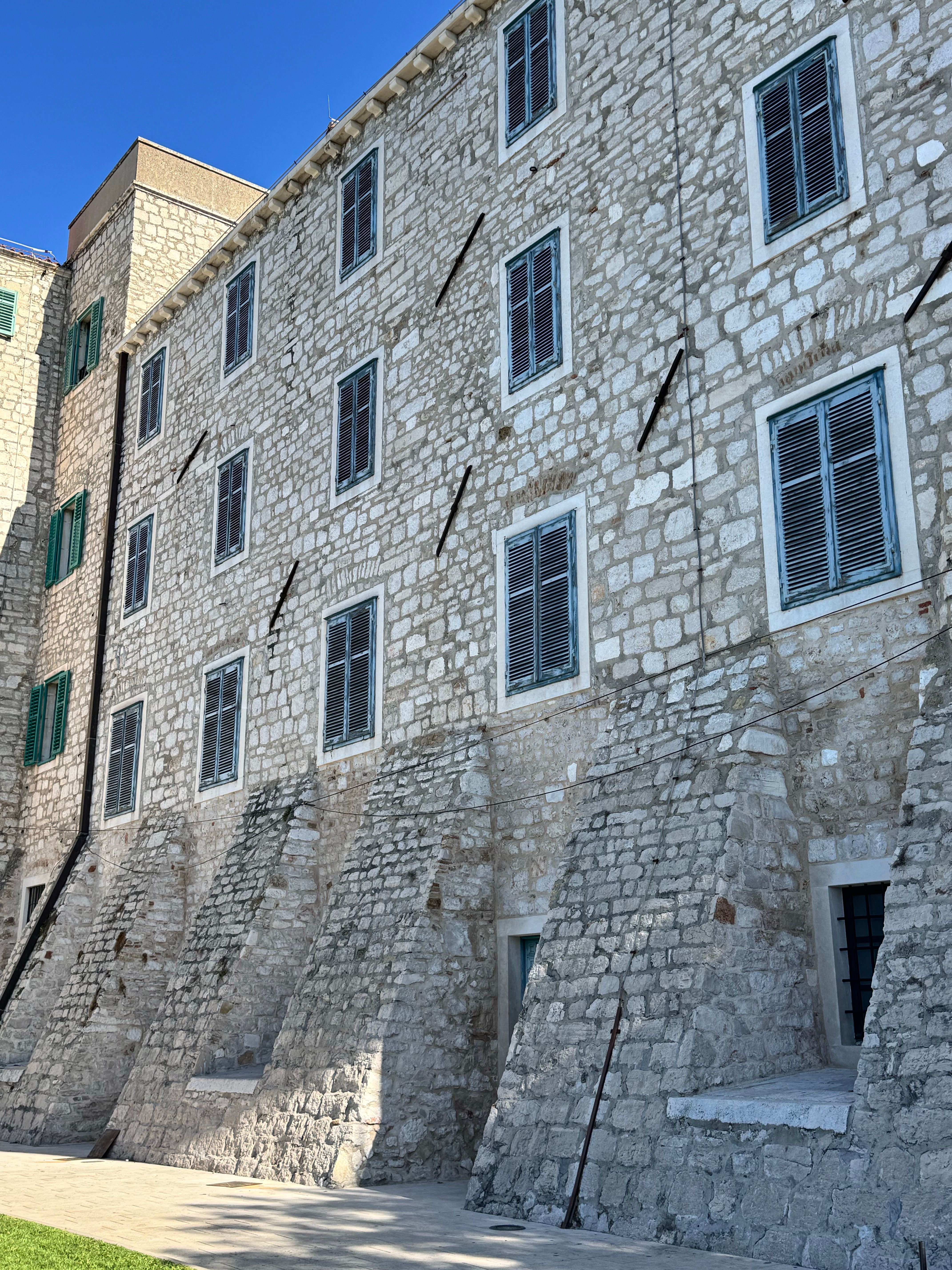 Historic Stone Building with Architectural Details · Free Stock Photo