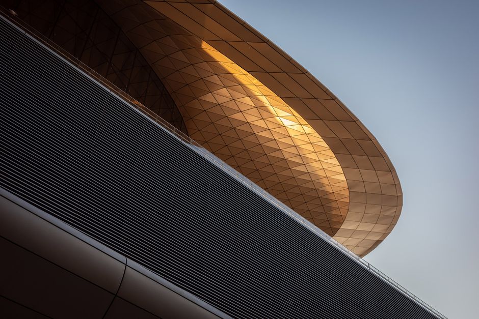 Inside a modern, air-conditioned Dubai Metro station, demonstrating comfortable public transport