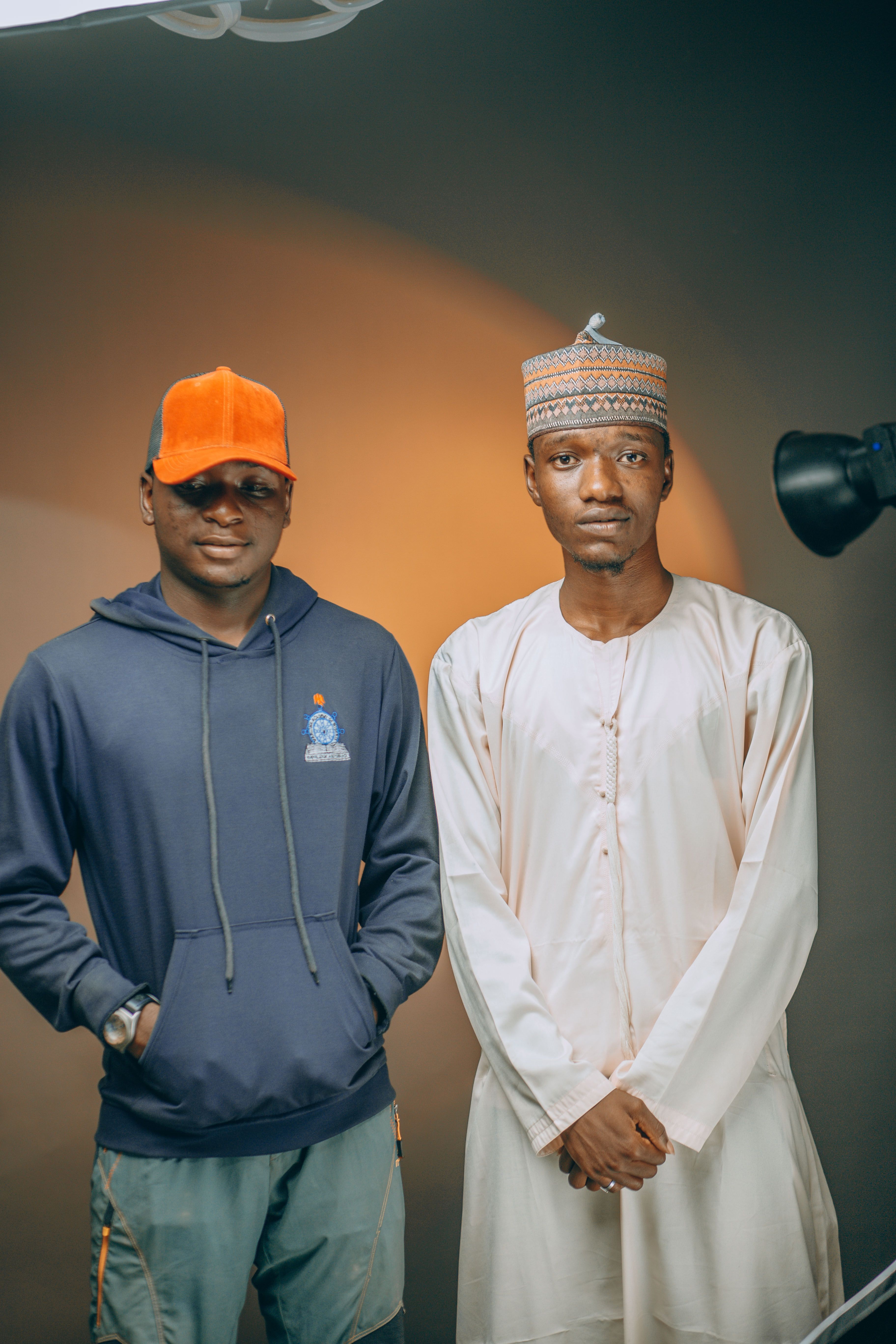 Portrait of Two Men in Traditional and Casual Wear · Free Stock Photo