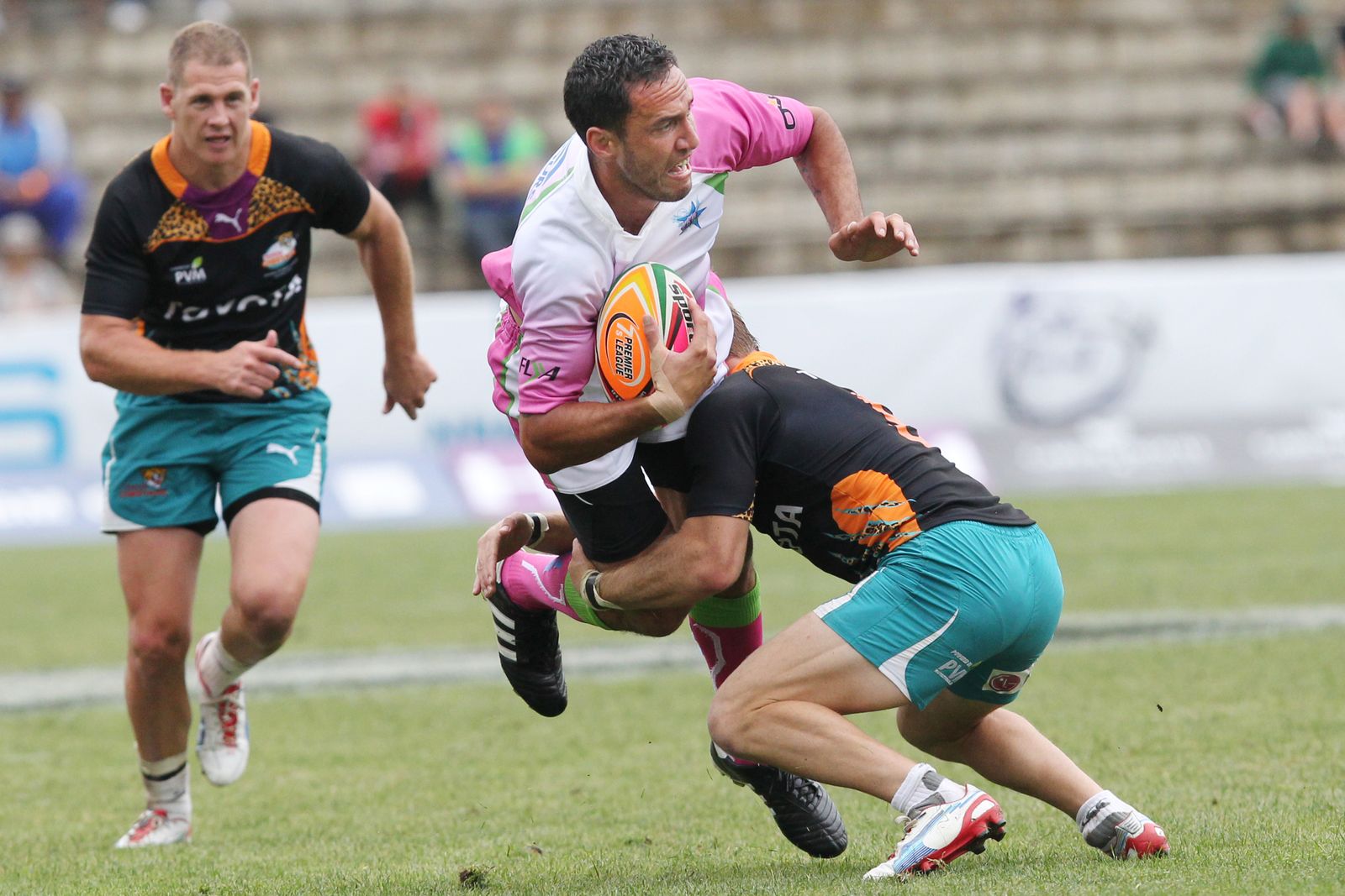 Kingsfold centre breaking through a tackle