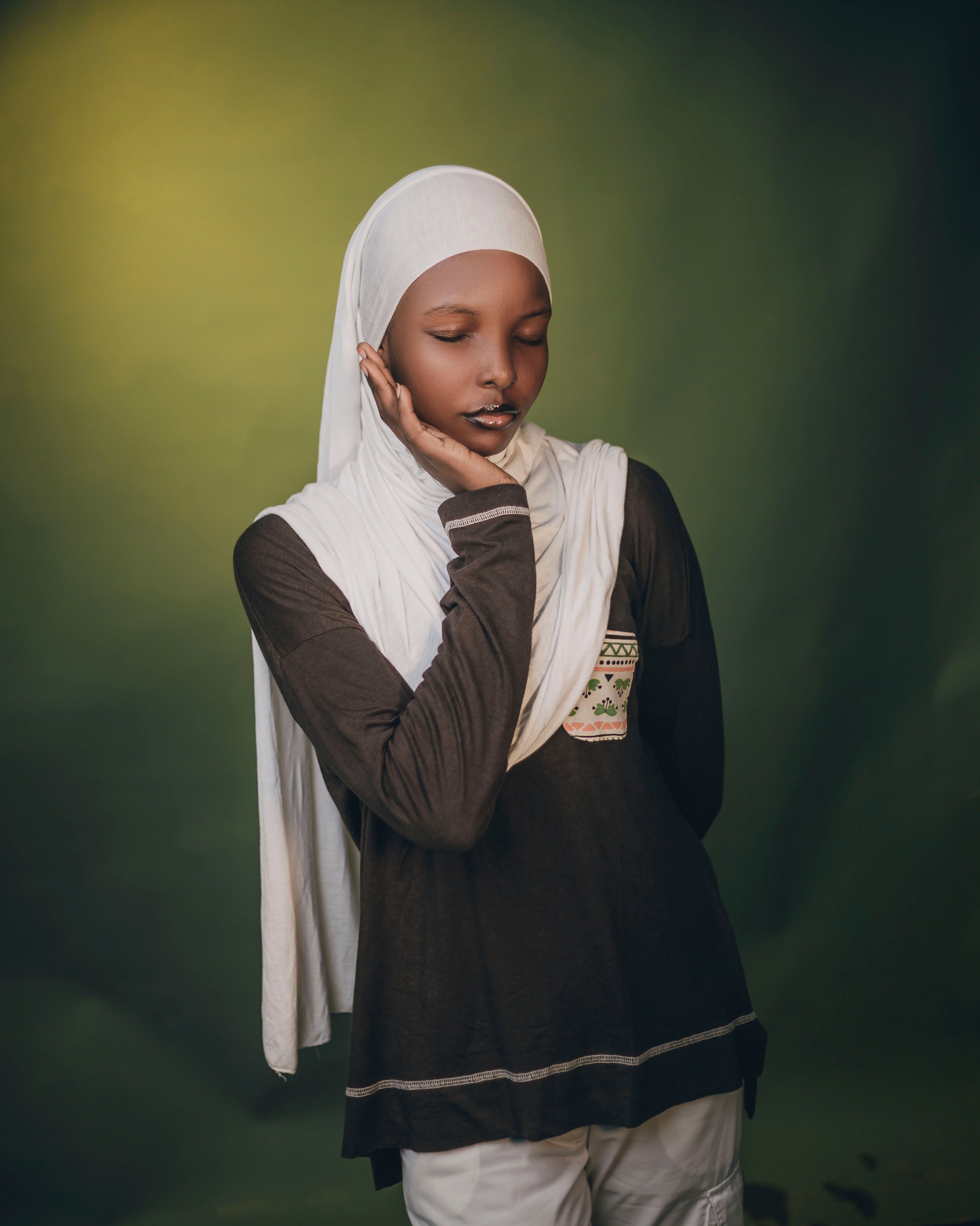 Thoughtful Young Girl in White Hijab Portrait · Free Stock Photo