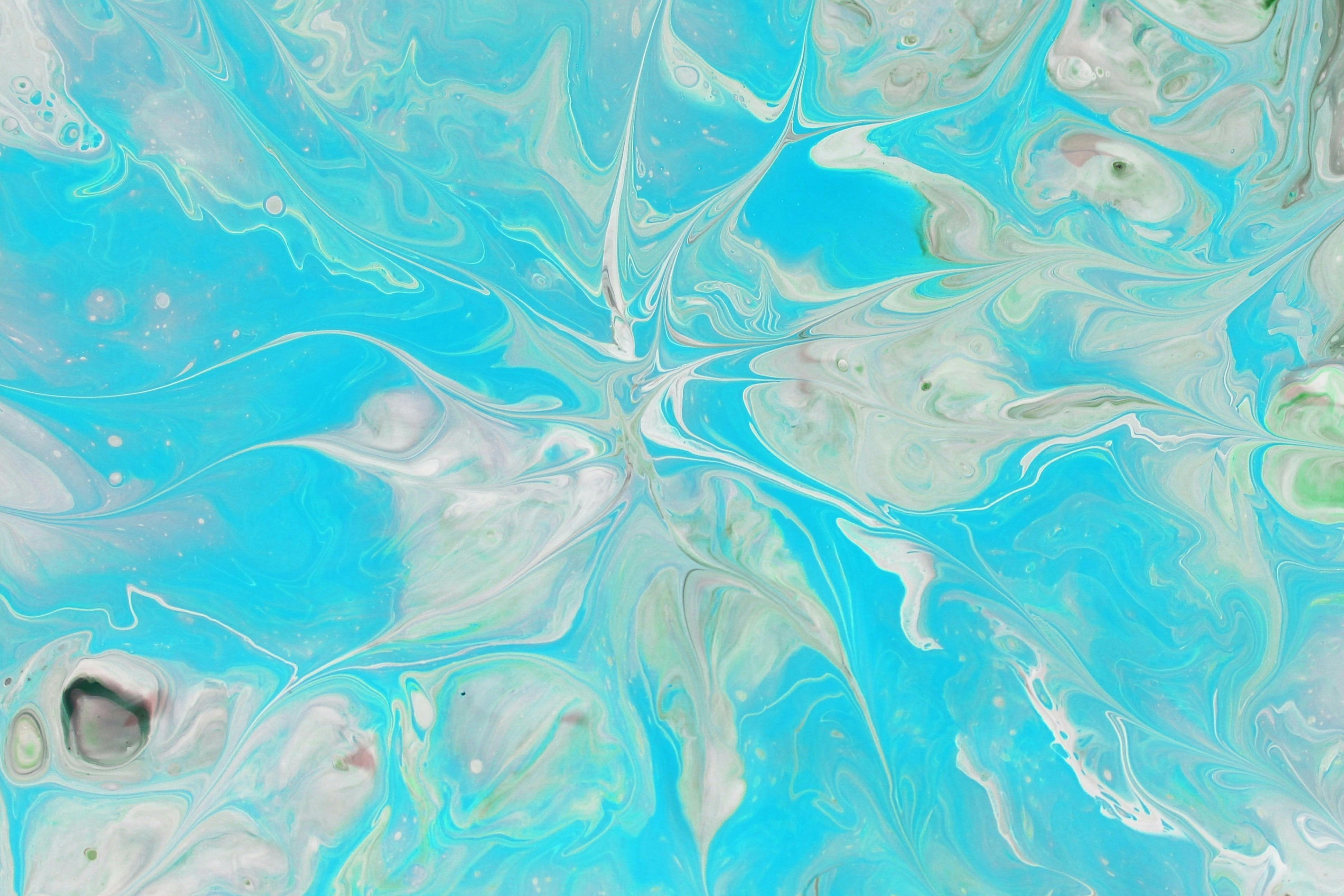 Free Vibrant abstract acrylic painting with swirling blue and white patterns. Perfect for modern art lovers. Stock Photo