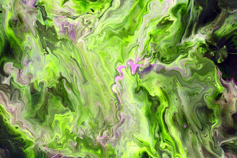 Abstract fluid art featuring vibrant green and purple hues with marbled swirls.