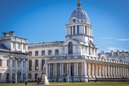 Free The historic Old Royal Naval College under a clear sky in London, England. Stock Photo