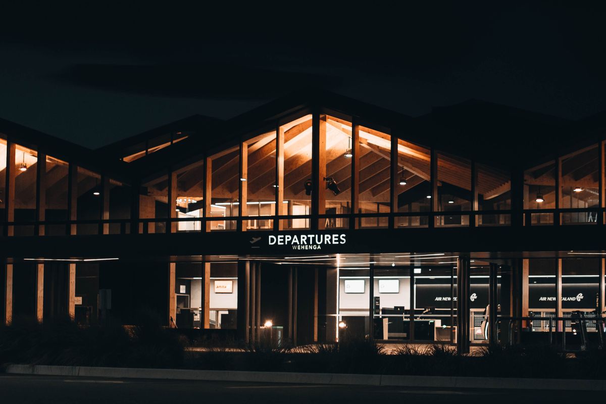 Airport departures building at night