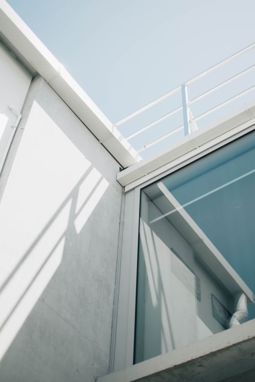 Glass and steel corner by Josiah Farrow on Pexels