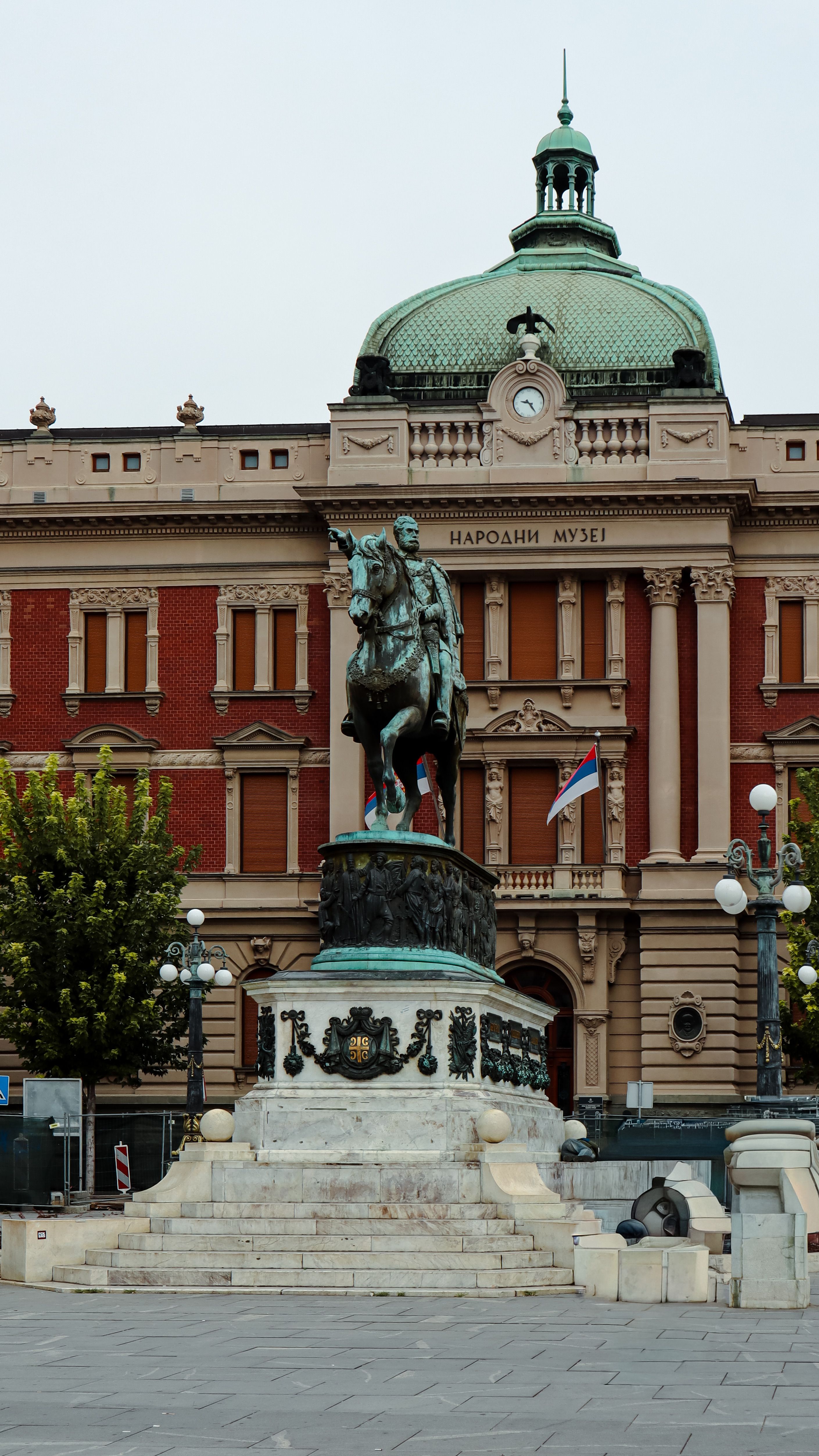 View of the Equestrian Statue of Prince Mihailo in Belgrade, with the National Museum in the background.
