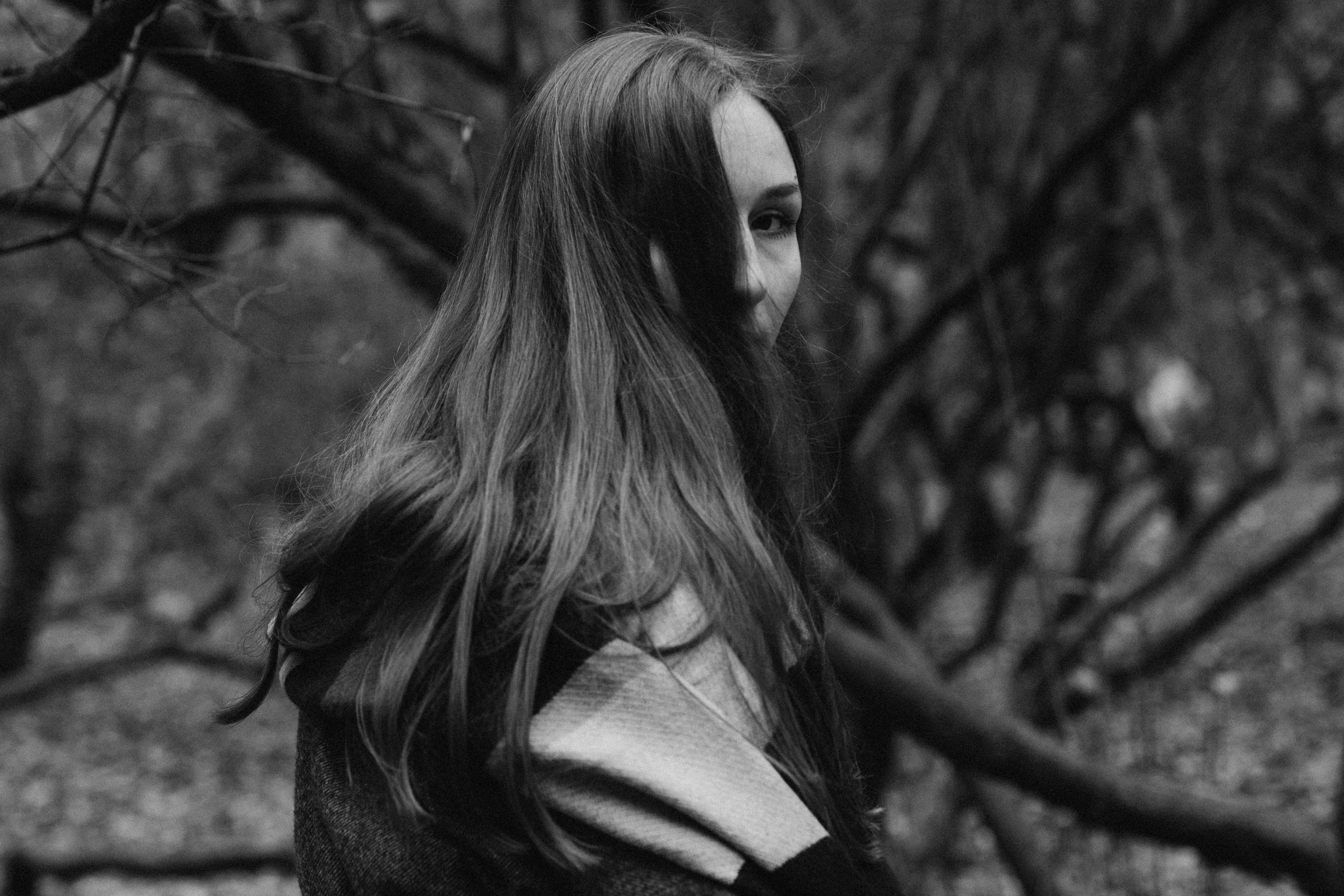 Moody Black and White Portrait in Forest · Free Stock Photo