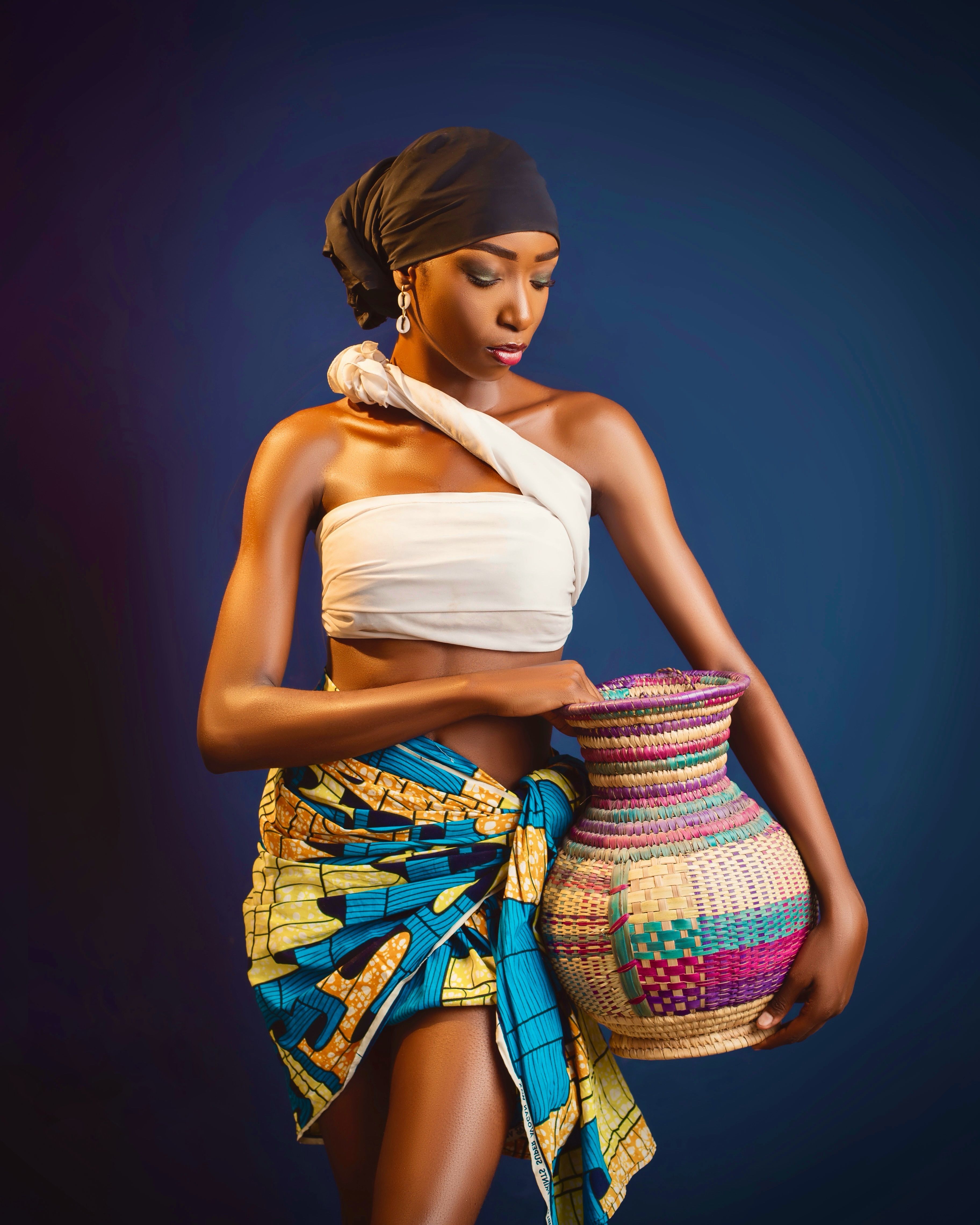 Cultural Portrait of a Nigerian Woman with Basket · Free Stock Photo