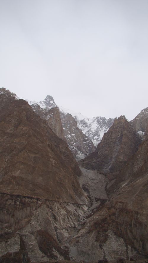 Free Lost in the unparalleled grandeur of Pakistan's Karakoram Range, deep within the serene Hunza Valley Stock Photo