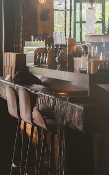 Warm and inviting rustic coffee shop interior with wooden bar and vintage decor.