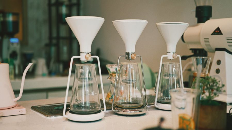 A minimal brew station with scales and kettle