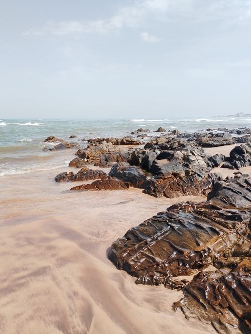 Free Explore the stunning rocky shoreline at low tide in Casablanca, Morocco, captured under a clear sky. Stock Photo