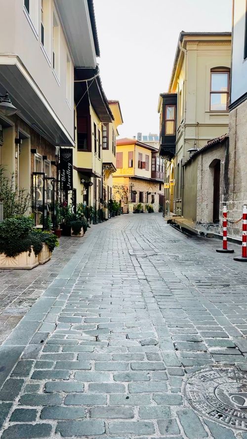 Free Explore a quaint, cobbled street with historic architecture in Kaleiçi, Antalya, Türkiye. Stock Photo