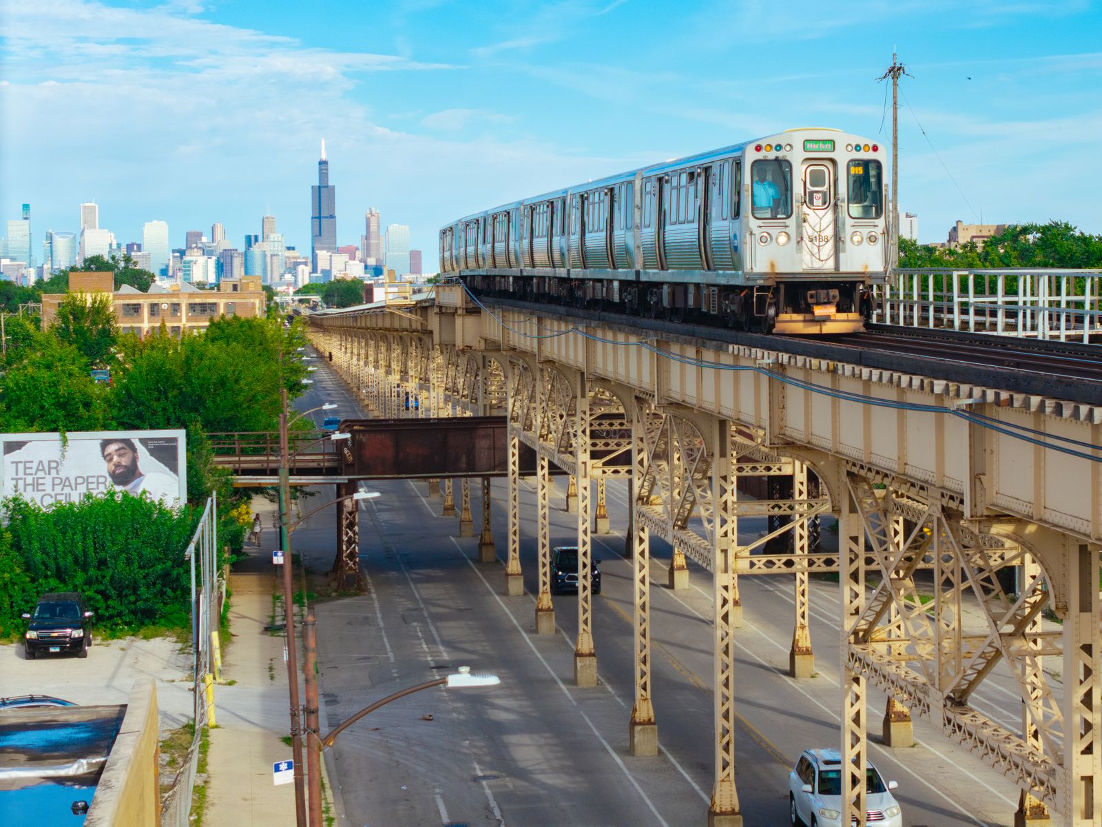 The Brown Line rounding the corner at Lake and Wells. A Ventra card is the only ticket you need.