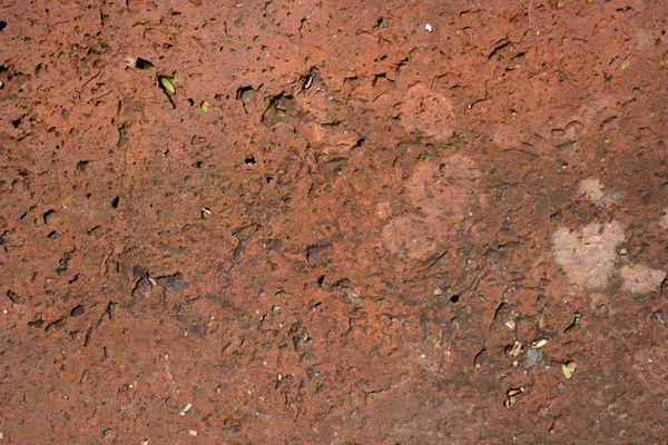 Adobe clay brick surface, photo by Tomás Asurmendi on Pexels