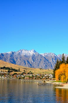 Breathtaking view of The Remarkables mountains and lake in Queenstown, New Zealand.