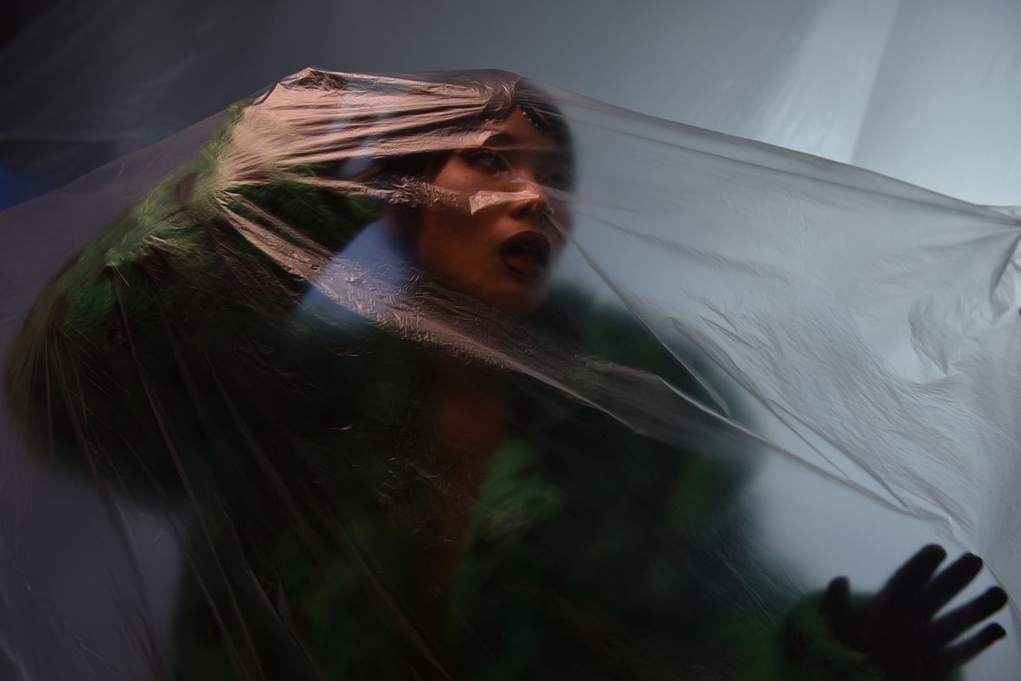 Artistic Portrait Through Transparent Material · Free Stock Photo