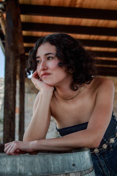 Portrait of a woman enjoying a warm day in a vineyard in Querétaro, México.