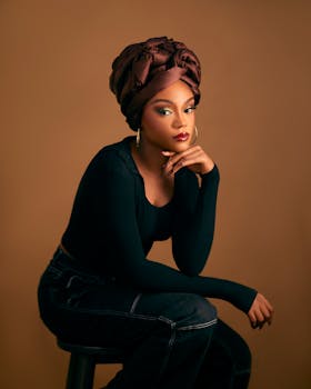 Portrait of a fashionable woman wearing a chic headwrap, exuding elegance.