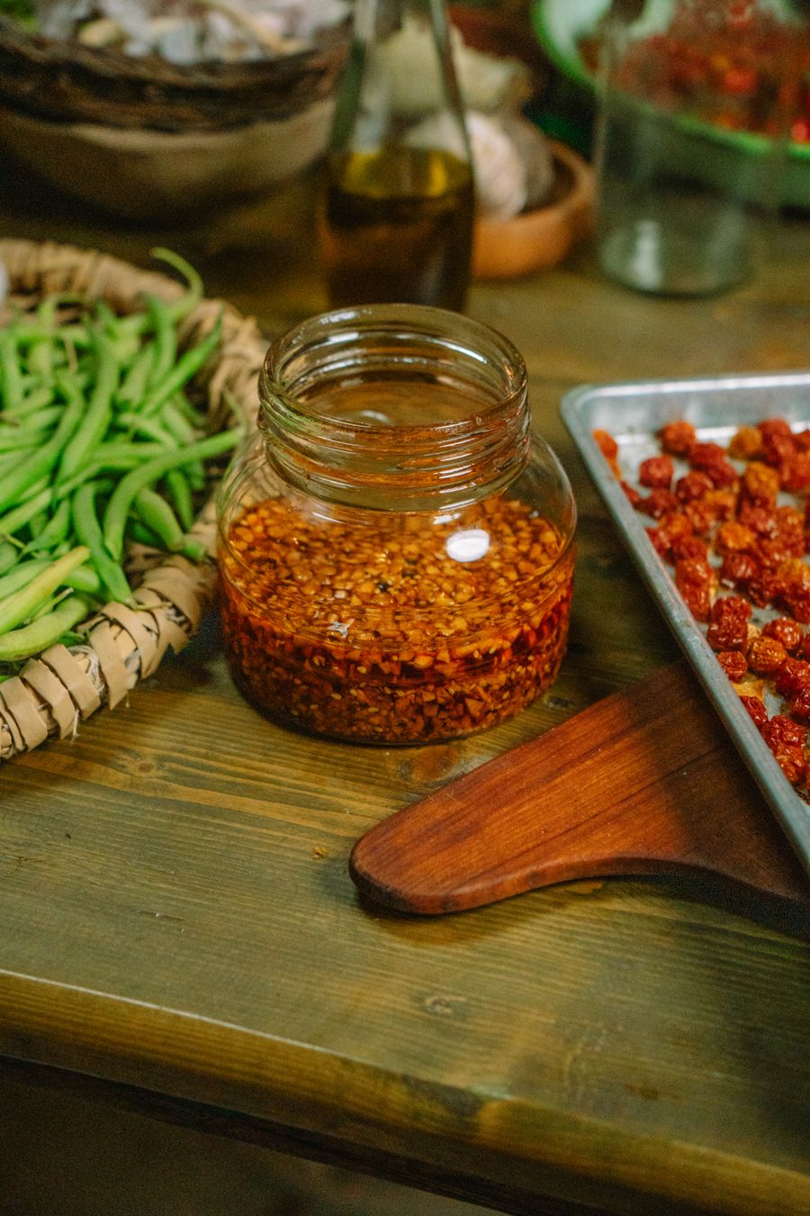 Jar of house chili oil with crushed chilies