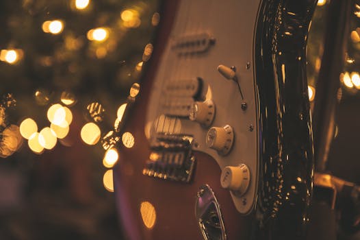 优雅的电吉他搭配发光的散景灯，营造出音乐氛围