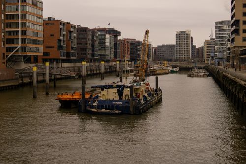 Free Captivating daytime view of Hamburg's HafenCity buildings and harbor. Stock Photo