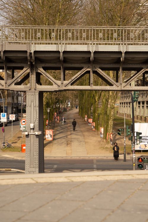 Free Urban pathway beneath a bridge in Hamburg, Germany, capturing daily life in a city setting. Stock Photo
