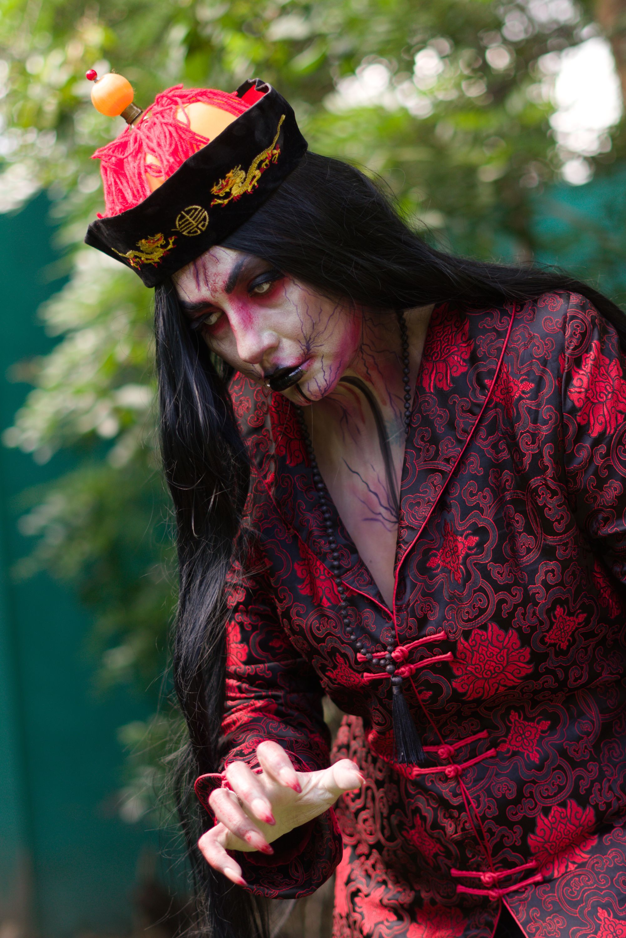A cosplay depiction of a traditional Chinese vampire-style undead figure directly illustrates the jiangshi concept for this&hellip;