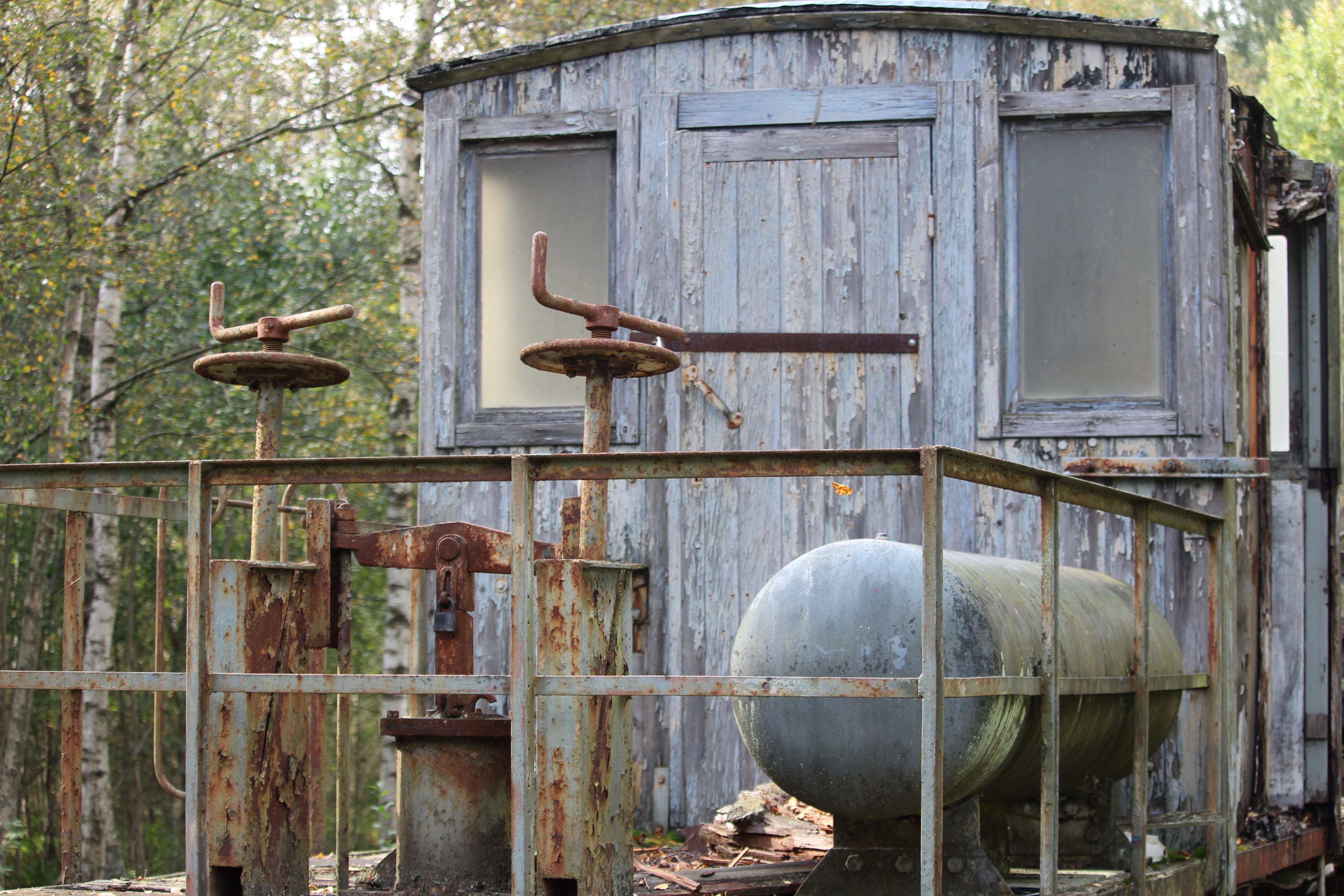Rustic Abandoned Train Car with Weathered Wood · Free Stock Photo