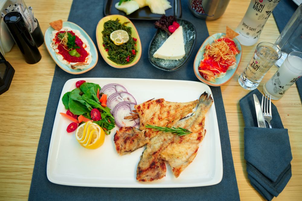 Grilled fish with Mediterranean sides