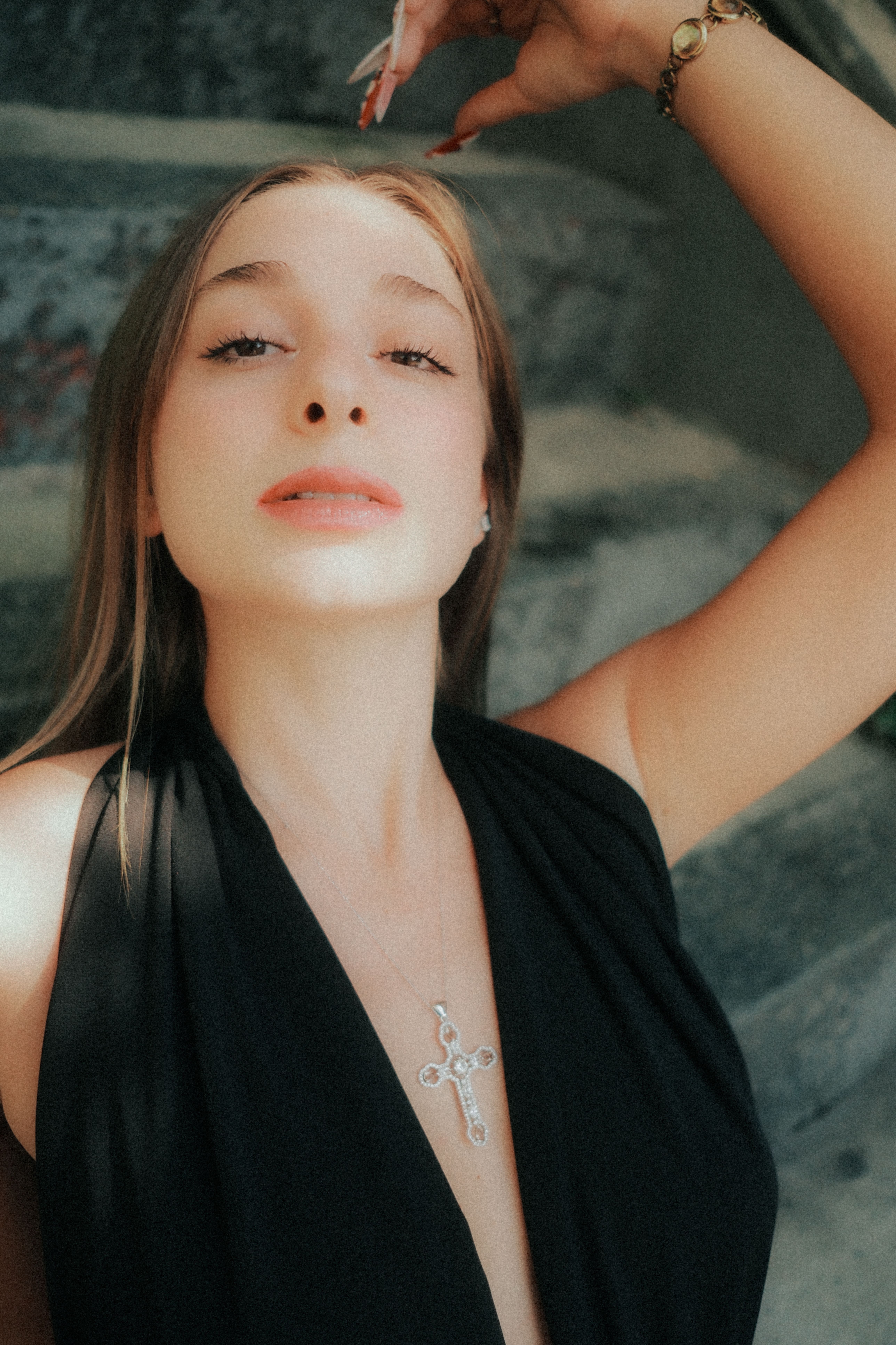 Elegant Young Woman Posing in Black Dress · Free Stock Photo