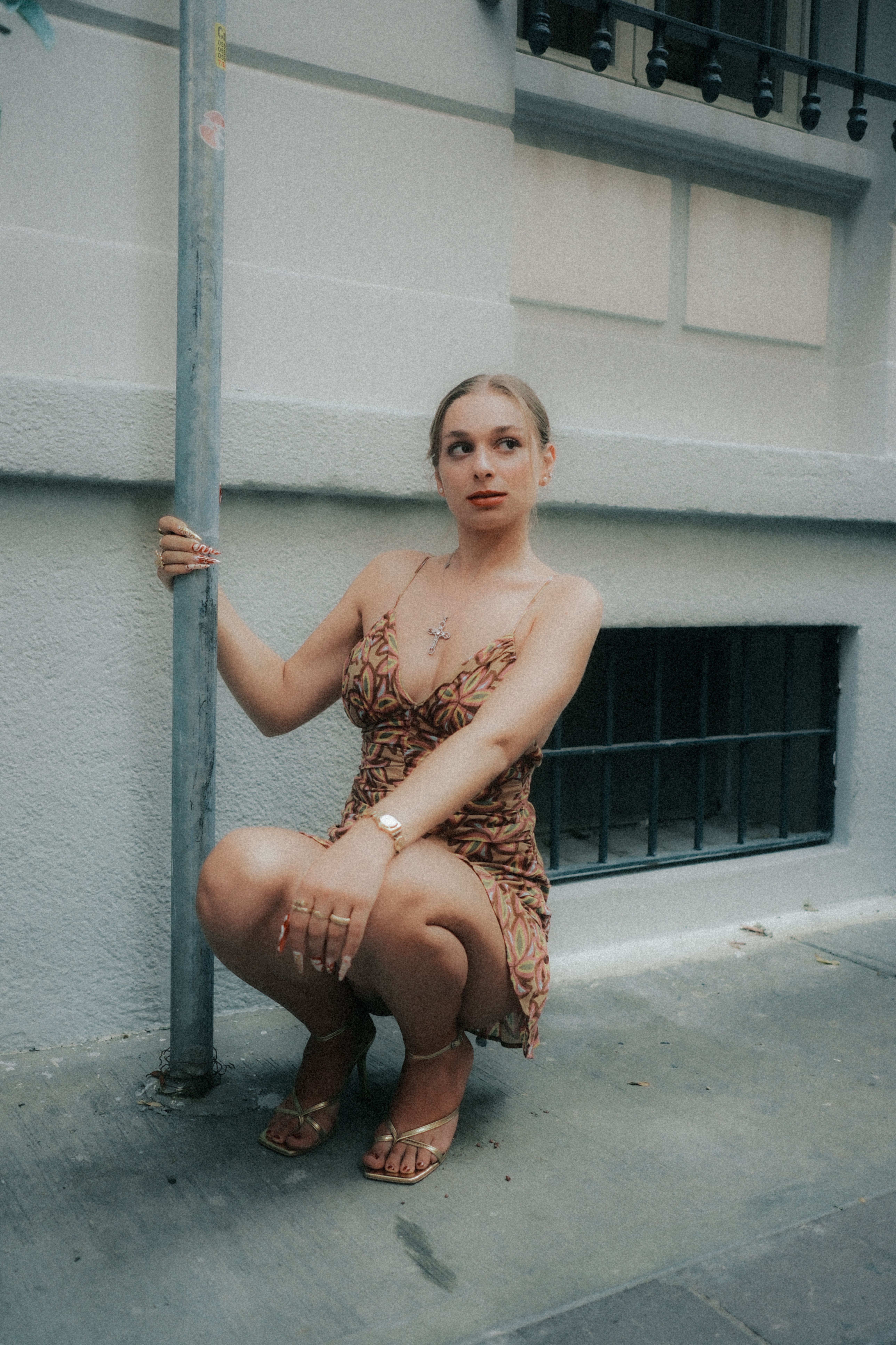 Stylish Woman Posing Outdoors in Urban Setting · Free Stock Photo
