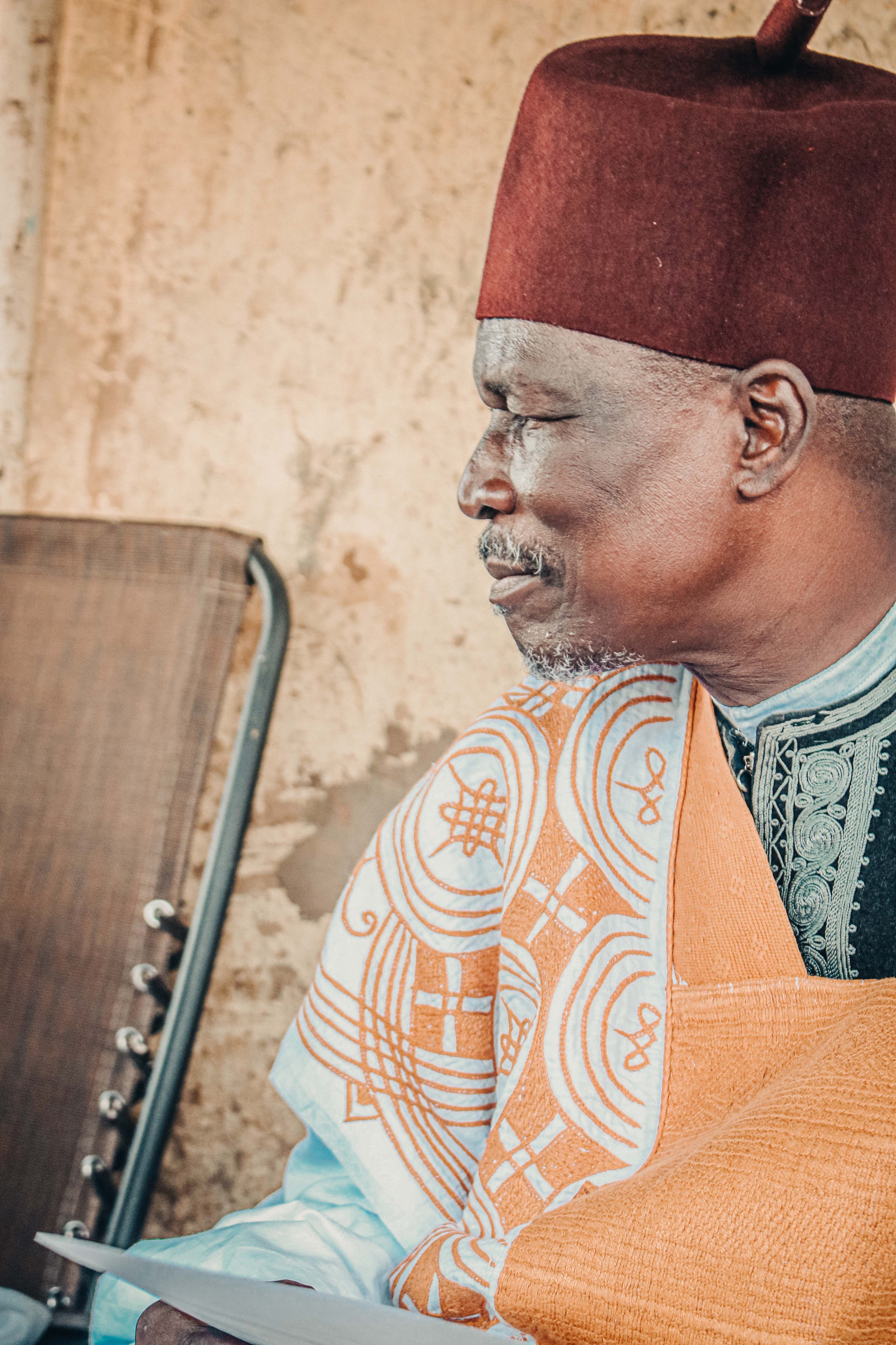 Elderly Nigerian Man in Traditional Attire · Free Stock Photo