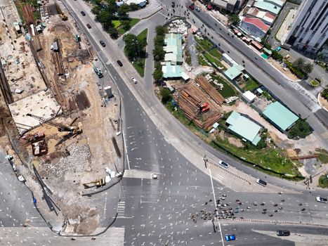 Aerial photo showcasing a busy urban intersection and ongoing construction in Ho Chi Minh City, Vietnam.